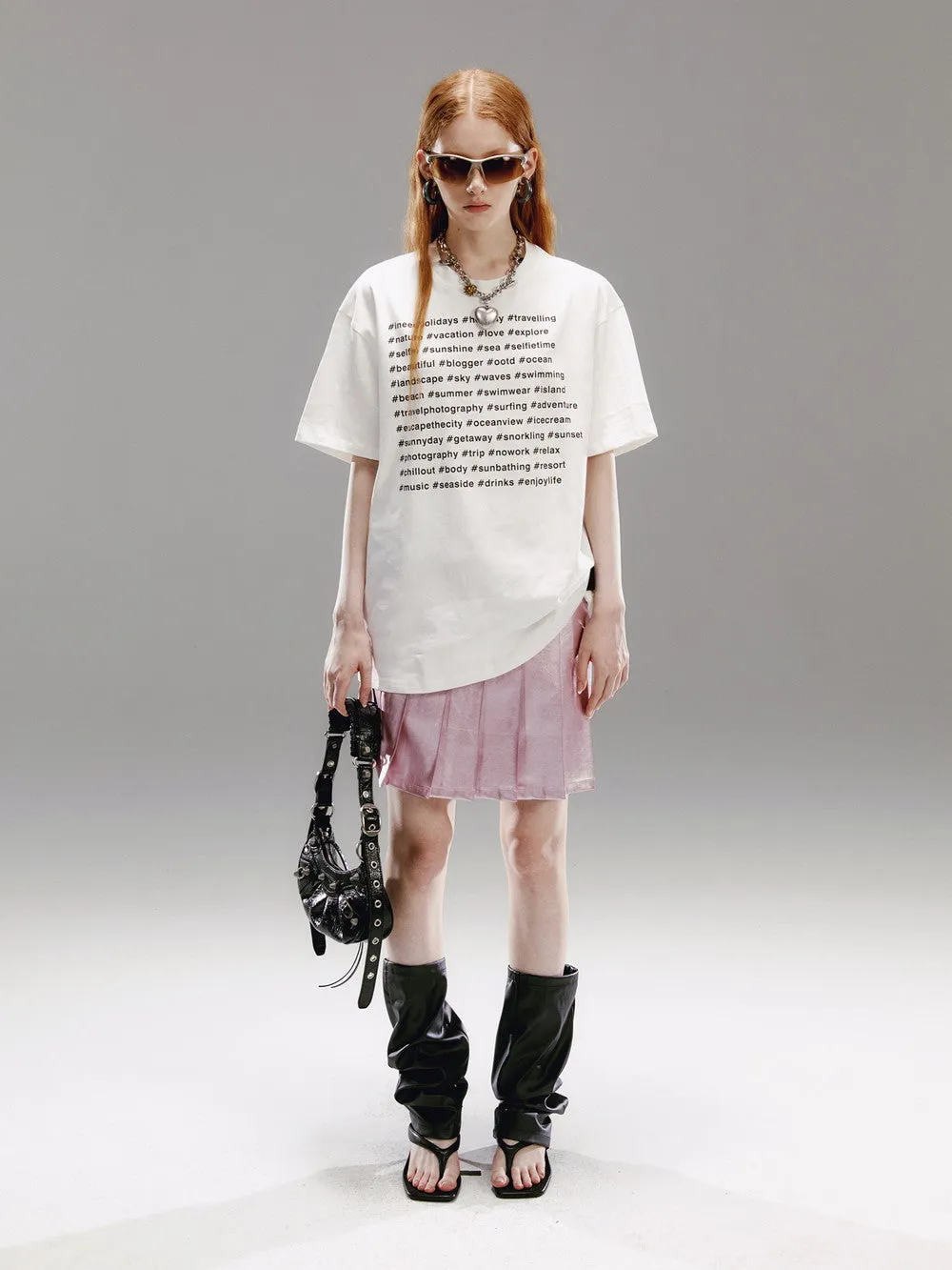 Pleatas Glossy Leather Mini-Skirt